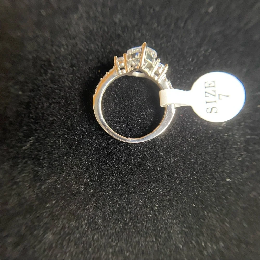 🆕 CZ center stainless steel ring with CZ accents